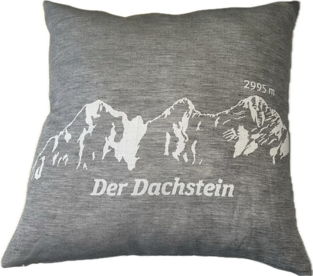 Dark grey decorative cushion with light Dachstein print, 'Der Dachstein' label and height 2995 m | © Planai-Hochwurzen-Bahnen Gesellschaft m.b.H.