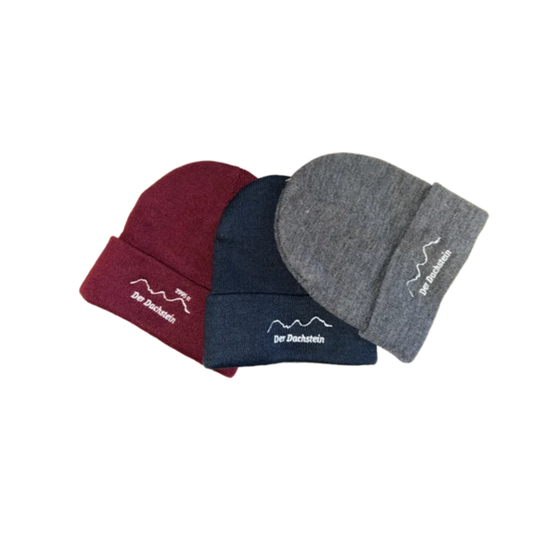 Three beanies in grey, navy and bordeaux with Der Dachstein logo on white background side by side | © Planai-Hochwurzen-Bahnen Gesellschaft m.b.H.